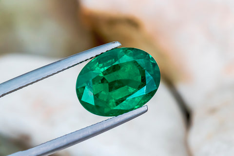 Emerald 5.42CT. 12.95x10.39x5.33MM Oval Cut GRS Certified