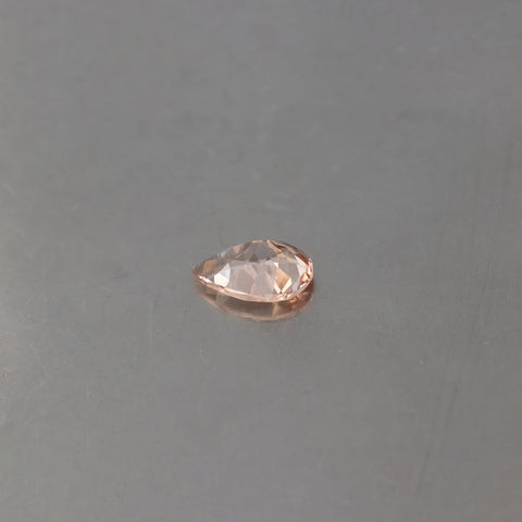 Morganite 3.27 CT 13X9 MM Pear Cut Top View, Morganite is an unusual gemstone. It fits into a unique part of the colour spectrum, somewhere between pink and a lustrous brown.