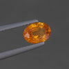 Orange Sapphire Oval 7X5 MM 1.05 CT. Mined In Africa. Tweezers