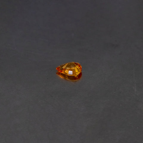 Orange Sapphire Pear 7X5X3.2 MM 0.78 Ct.. Mined In Africa. Top View