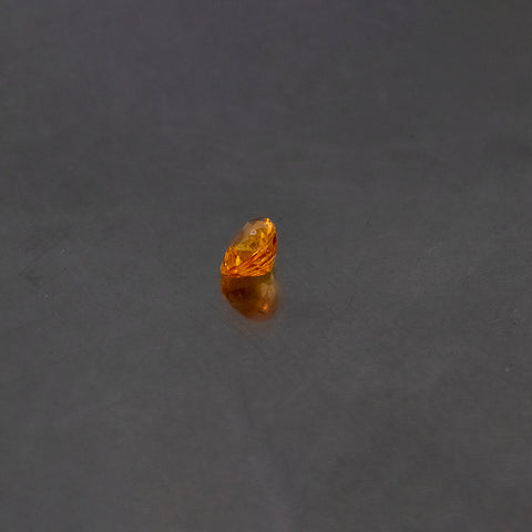 Orange Sapphire Pear 7X5X3.2 MM 0.78 Ct.. Mined In Africa. Side View