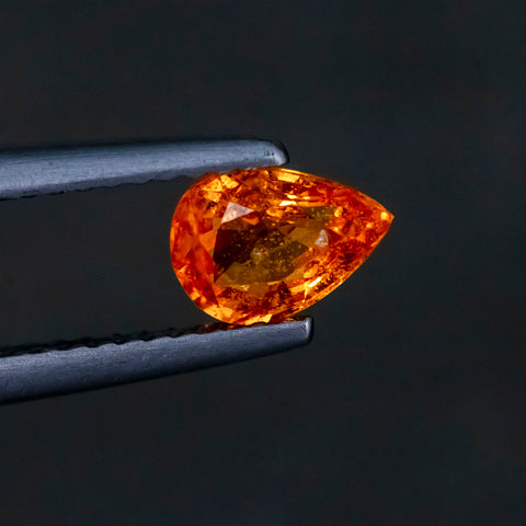 Orange Sapphire Pear 7X5X3.4 MM 0.94 CT. Mined In Africa. Tweezer