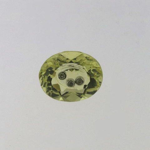 Diamond inside of Lemon Quartz 2.70 CT 10x8 MM Oval - shoprmcgems